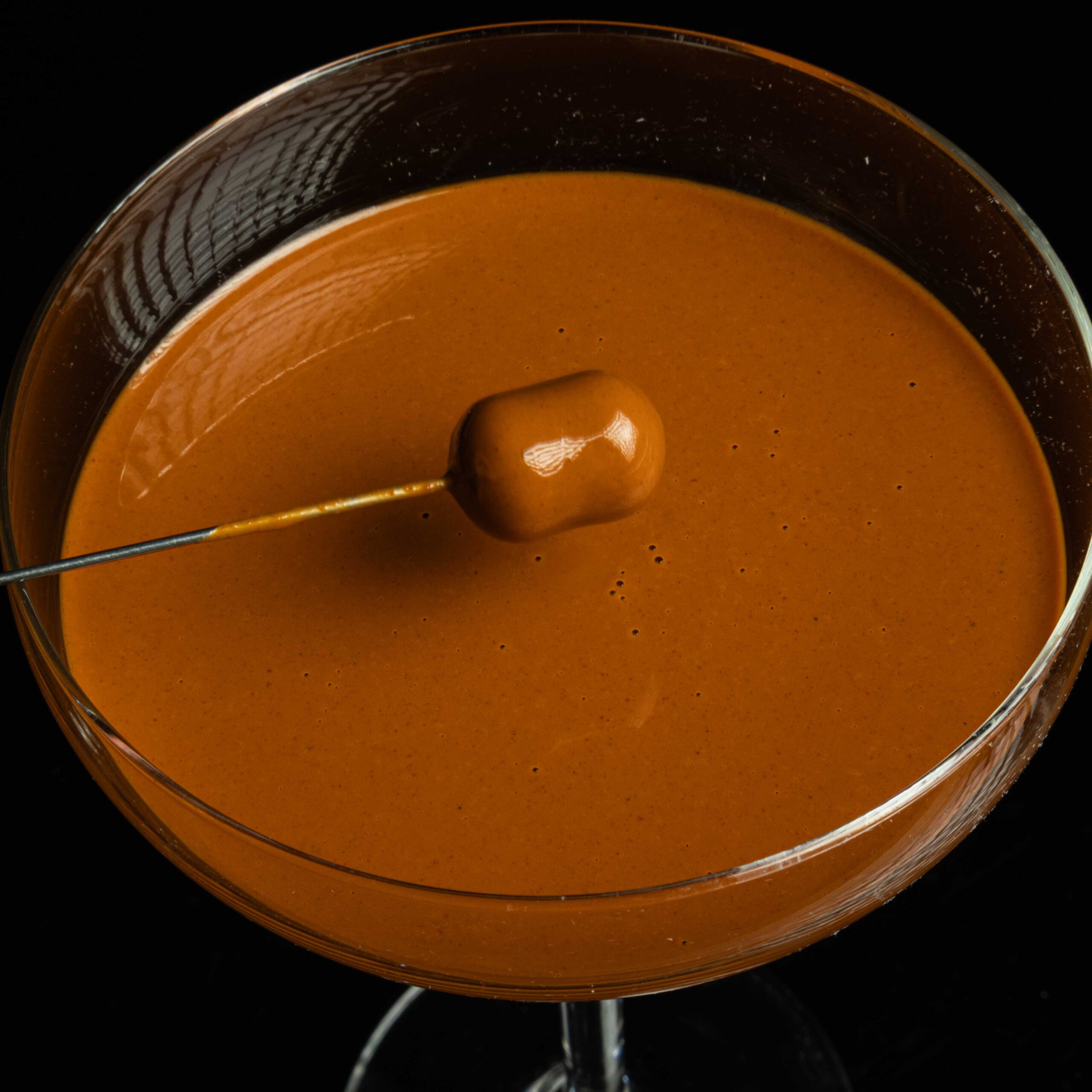 šokolado skonio skystas papildas karpių žūklei